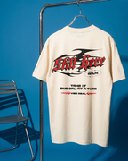 Off-white t-shirt with red and black text on a hanger against a blue background