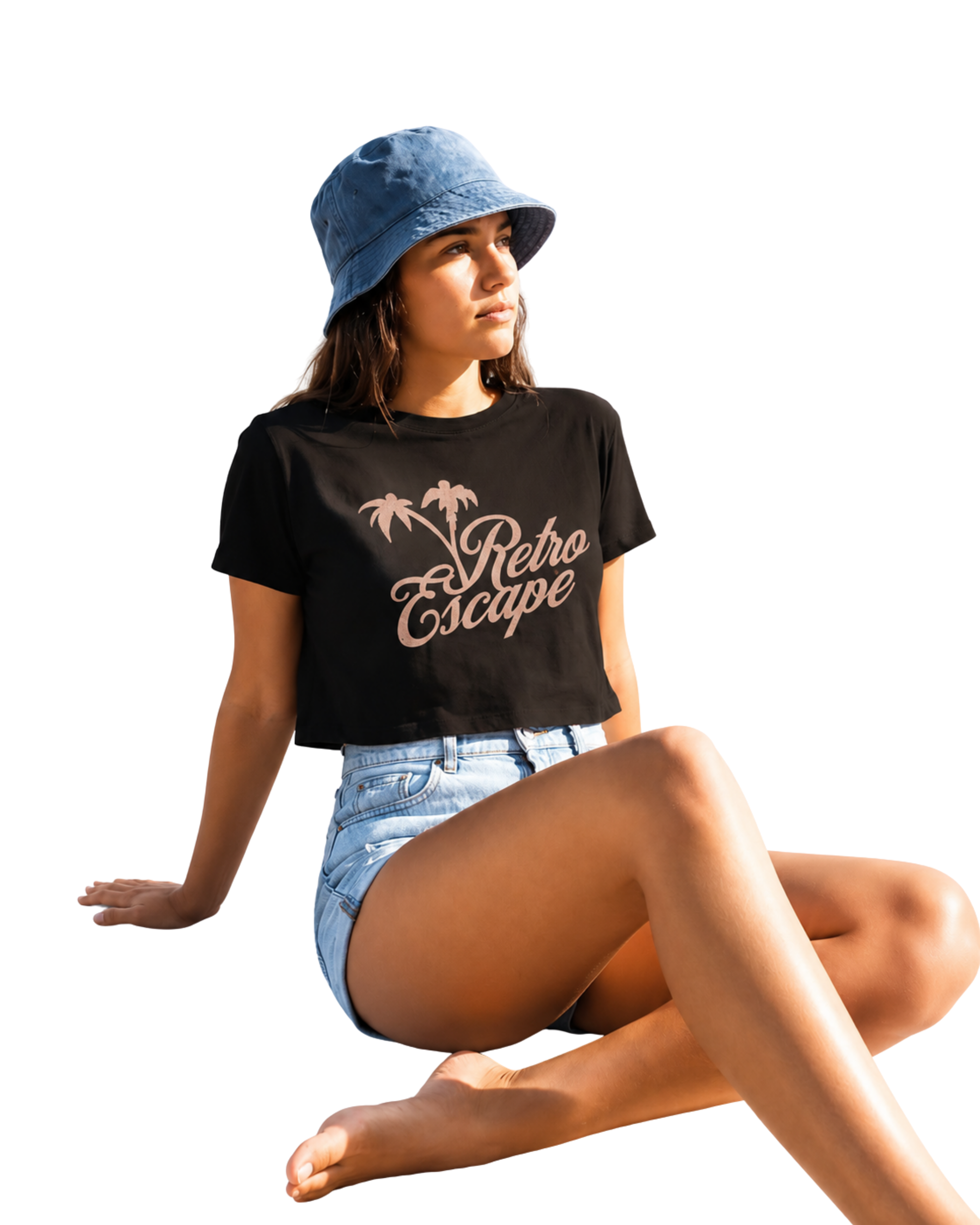 Woman wearing a black t-shirt with 'Retro Escape' design, denim shorts, and a blue bucket hat on a white background.