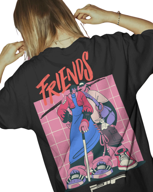 Black t-shirt with 'Friends' graphic design featuring animated characters on a pink grid background.