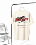 Off-white t-shirt with graphic design on a hanger against a white background