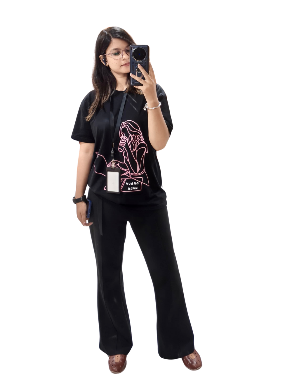 Person wearing a black t-shirt with a graphic design on a white background