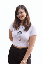 Woman wearing a white t-shirt with a graphic design on a white background
