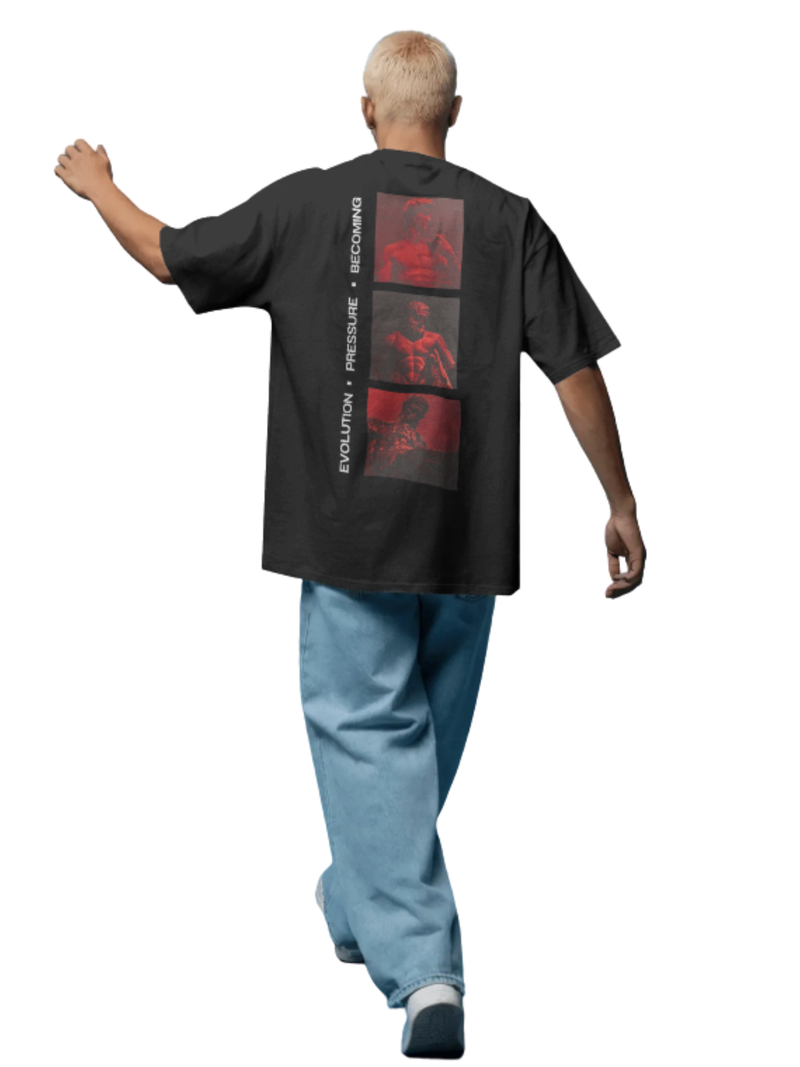 Man wearing a black t-shirt with red graphics on the back, walking on a white background