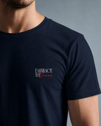 Navy blue t-shirt with 'Embrace the Chaos' text on a gray background