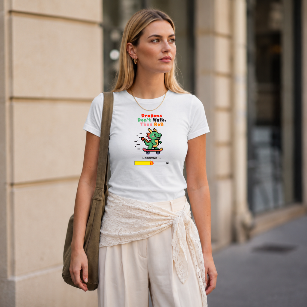 A woman stands outdoors wearing a white graphic ONVR T-shirt with a colorful cartoon dragon design and the text 'Dragons Don't Walk' 'They Roll'. 