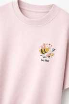 Be Kind with floral design on left pocket