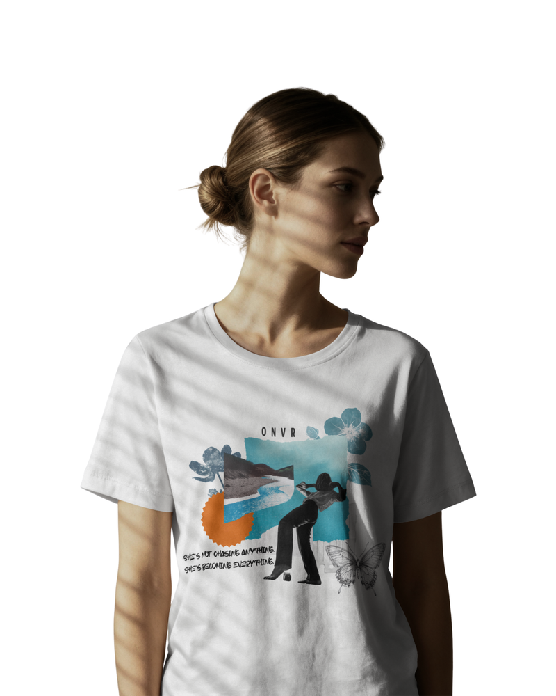 Woman model wearing a ONVR white t-shirt with a graphic design on a white background