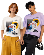 Two people wearing t-shirts with artistic designs on a white background